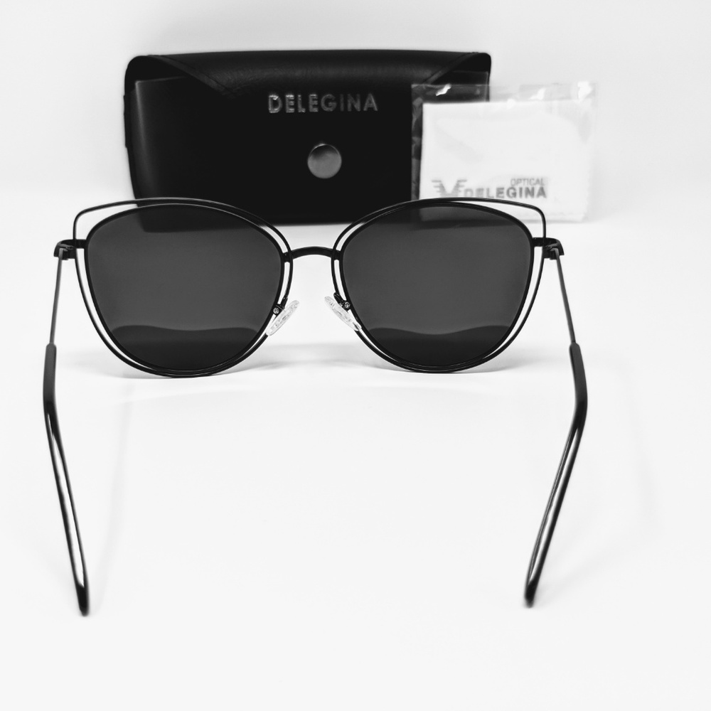 Stylish dark black sunglasses with bold gold trim - Picture 2 of 3